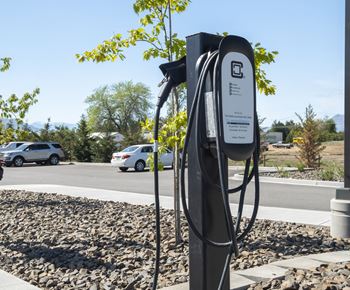A charging station on the side of a street